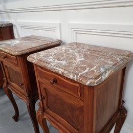 French Louis XVI style figured Walnut marble top bedsides. In good original detailed condition.