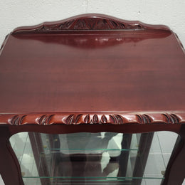 Vintage Mahogany petite display cabinet with three solid glass shelves. Ideal for a small area and is in good original detailed condition.