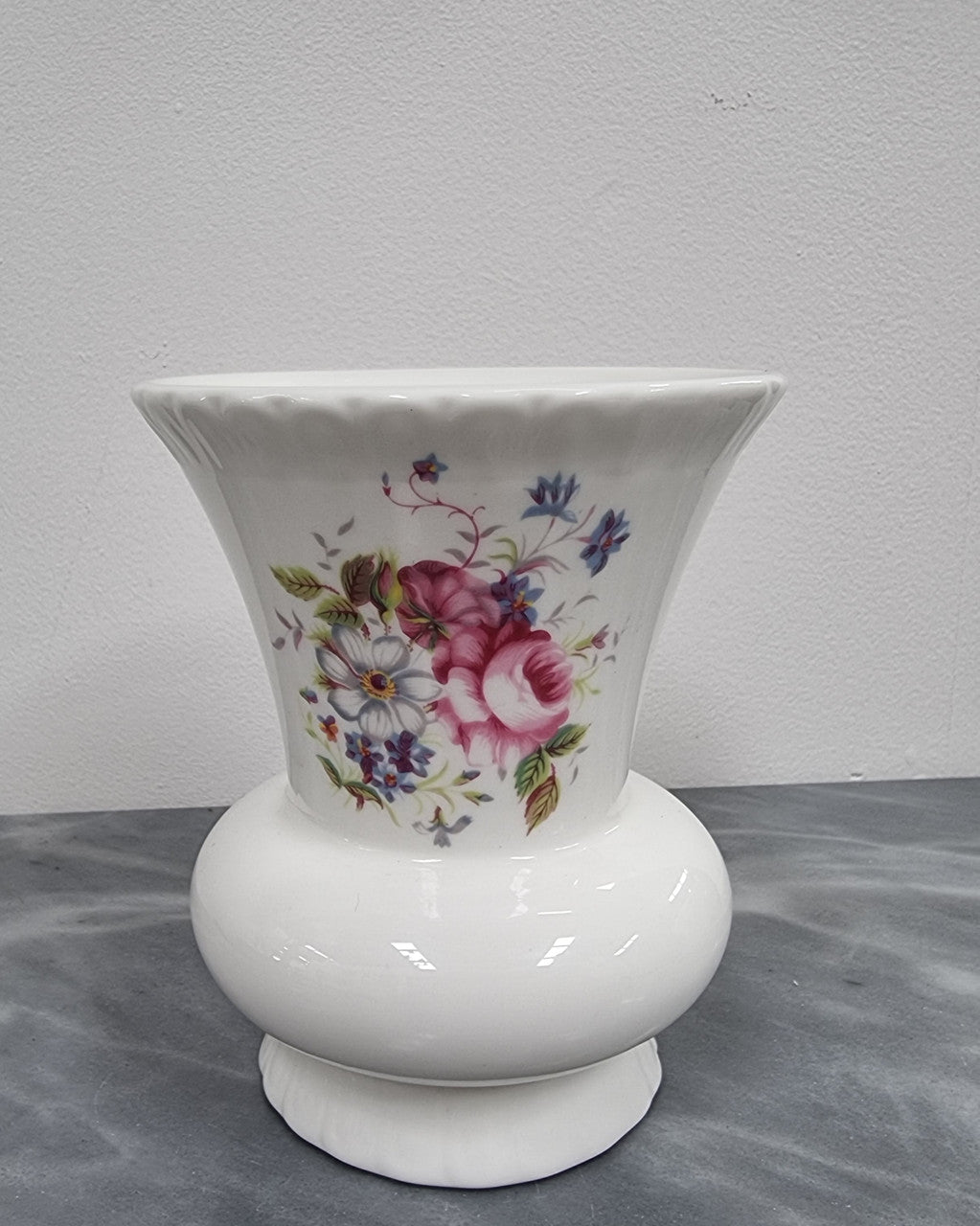 Decorative Coalport floral bone china vase. It is in good original condition, please view photos as they help form part of the description.