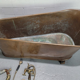 Sourced from France a rare full copper Antique bath tub on feet and includes an overflow, fittings, taps ect. In good original condition.