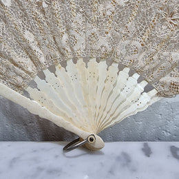 Beautiful Edwardian bone and lace hand held fan. In good original condition, please view photos as they help form part of the description.