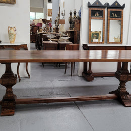 French style reclaimed Elm Farmhouse table with stretcher base and amazing carving underneath. Table can sit 10-12 people and is in good original detailed condition.