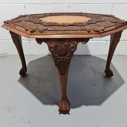 Heavily carved Teakwood round Chinese coffee table. In good original detailed condition. Circa: 1920