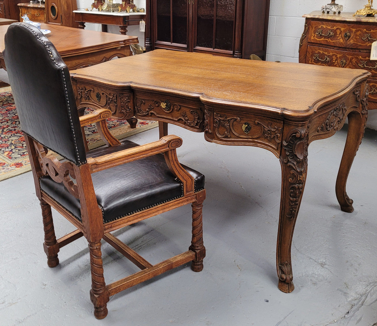 19th Century Louis 14th style quality French carved Oak bureau plat. It has three lockable deep drawers and beautifully carved legs. It has been sourced from France and is in good original detailed condition.