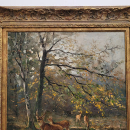Charming oil painting on canvas depicting a forest scene and deer in an ornate gilt frame. In good original detailed condition.