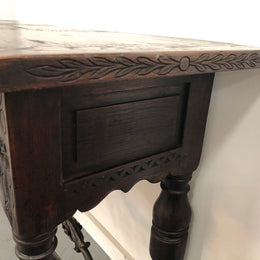 Spanish late 19th century carved oak three drawers console/side table. Superb wrought iron undercarriage. In good condition. Circa 1900's.