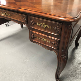 Antique French Walnut and parquetry top Louis XV style partners desk. In good original detailed condition.