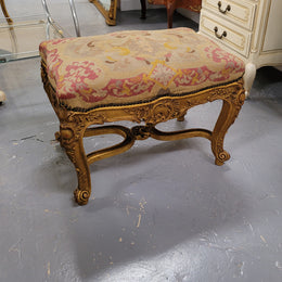 Charming 19th Century gilt wood tapestry covered Louis XV style stool. It has a beautifully carved base and undercarriage and it has been sourced from France. It is in good original detailed condition, please view photos of tapestry has they help form part of the description.