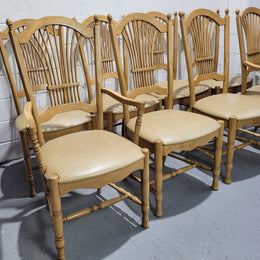 French country style set of six dining chairs and two carvers with leather seats. They are all in good original detailed condition.