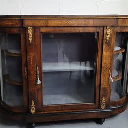 Victorian Rosewood inlaid side cabinet/credenza with velvet lined shelves and gilt mounts. It has been sourced locally and is in good original condition with loads of character.