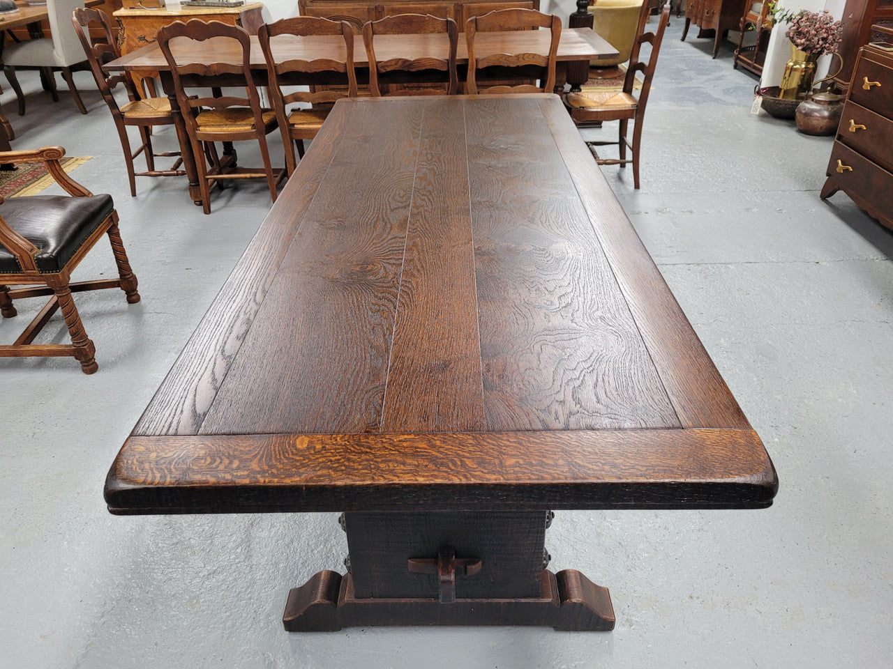 Stunning French dark Oak refectory style dining table. It has been sourced from France and is in good original detailed condition.