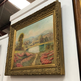Beautiful French country scene oil on canvas in a lovely decorative frame in good original condition..