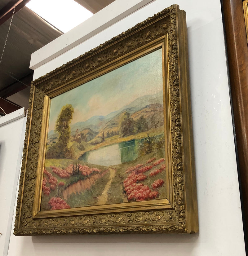 Beautiful French country scene oil on canvas in a lovely decorative frame in good original condition..