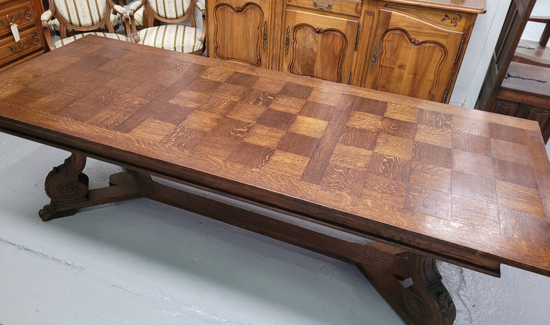 Stunning 2.55 meter French Spanish style parquetry top Oak table. Amazing one piece top and it is in good original detailed condition.