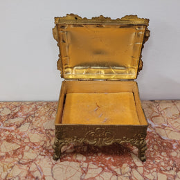 Lovely vintage gilded metal jewellery casket with cushion on the inside (can be removed).  In good original and detailed condition.