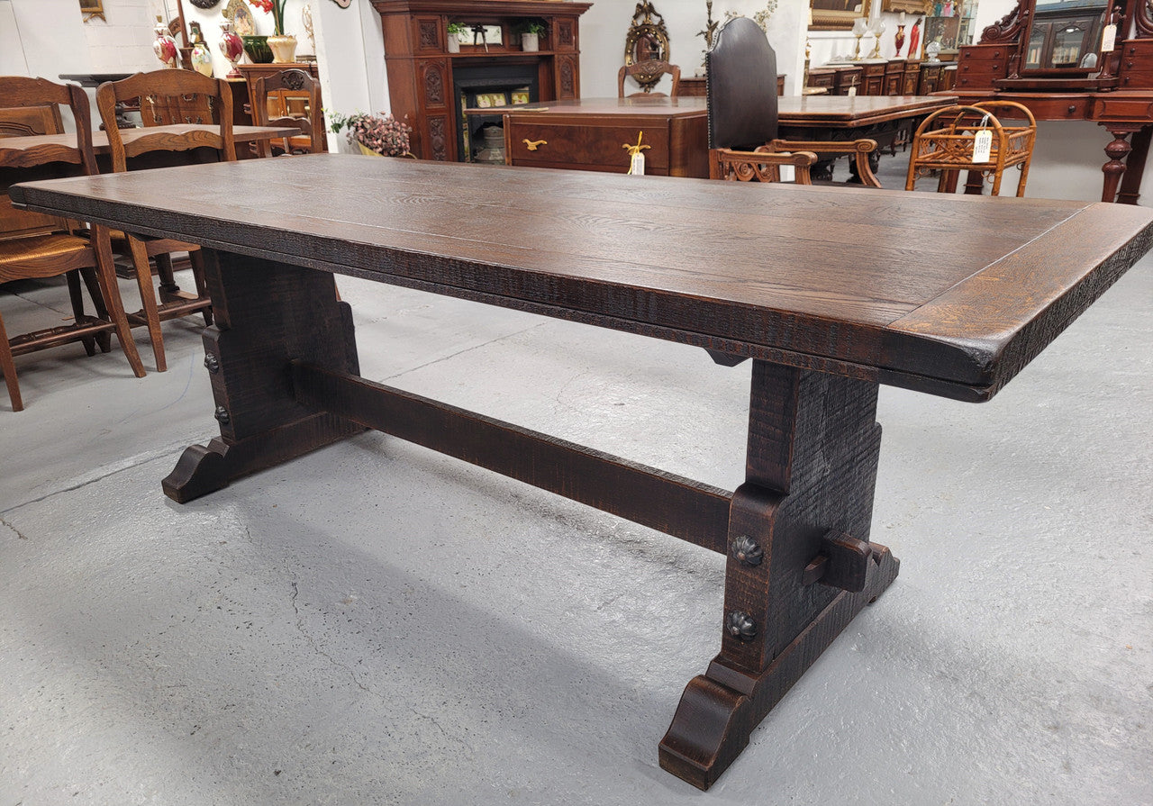 Stunning French dark Oak refectory style dining table. It has been sourced from France and is in good original detailed condition.