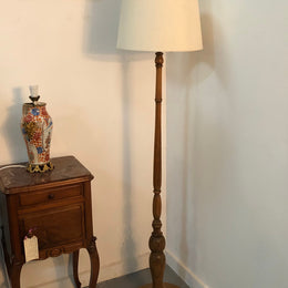 Tudor style Oak standard lamp, rewired and with foot switch. In good original condition.
