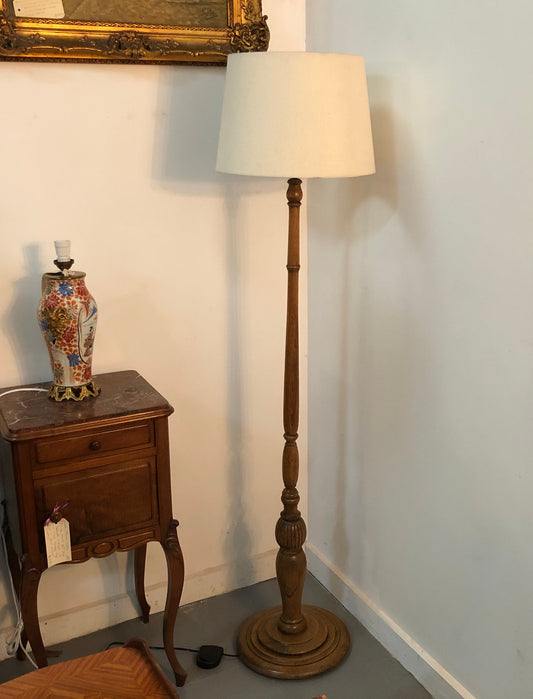 Tudor style Oak standard lamp, rewired and with foot switch. In good original condition.