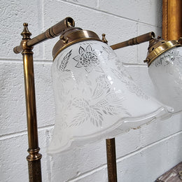 Pair of tall Antique style table lamps with glass floral etched shades. They have been sourced locally and are in good original detailed working condition.