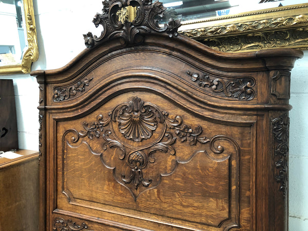 Antique French Oak Louis XV style mantle/trumeau mirror. It has its original mirror and is in good original detailed condition.