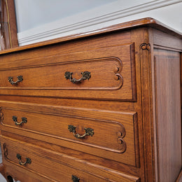 French Louis 15th style Oak three drawer chest of drawers with wooden top. It has been sourced from France and is in good original detailed condition.