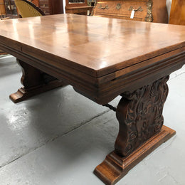 A beautiful French oak, Spanish style parquetry top extension table, with amazing carving and lovely details in very good condition.