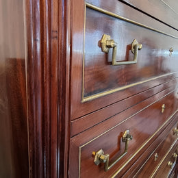Absolutely beautiful French Empire seven drawer semainier with a lovely white carrara marble top and amazing bronze handles. It has its original key and is in good original detailed condition.