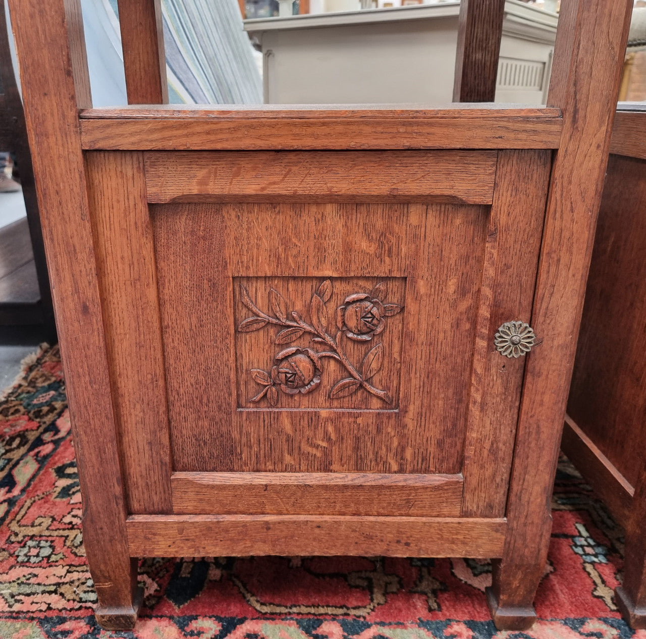 Charming pair of French Oak Arts and Crafts bedsides with shelf, cupboard with carving and marble top.  They have been sourced from France and are in good original detailed condition.