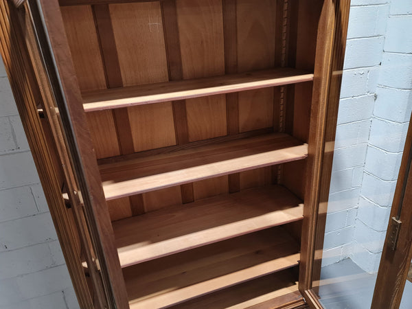 Stunning French Henry II style Walnut two door bookcase. In good original detailed condition.