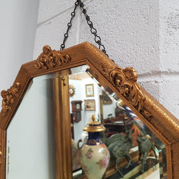 VA beautiful Vintage octagon shape ornate gilt mirror, with bevelled glass and in good original condition.