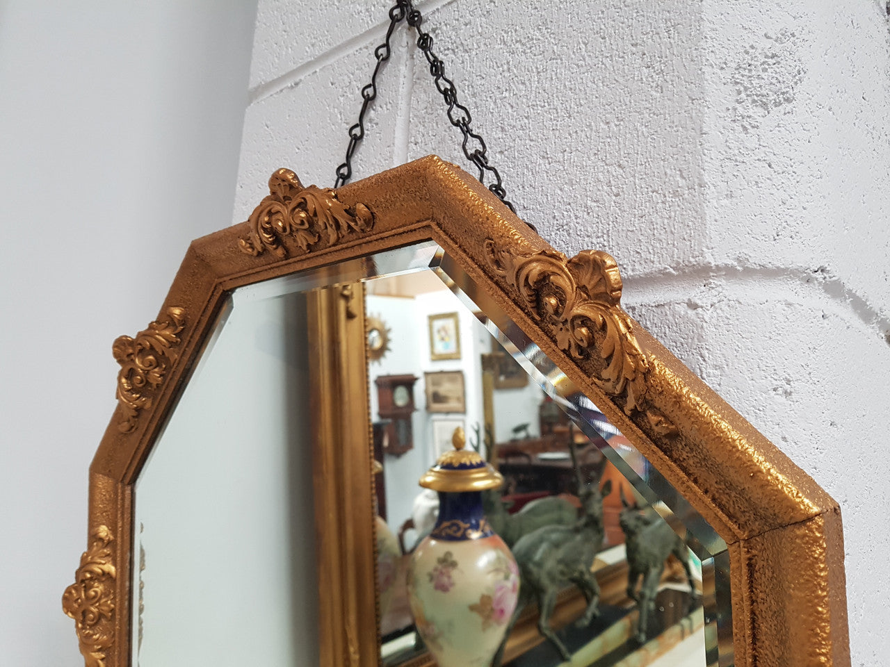 VA beautiful Vintage octagon shape ornate gilt mirror, with bevelled glass and in good original condition.