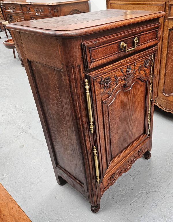 Louis 15th style oak 19th century cabinet with lovely brass hinges, handles & charming carving.  Circ: 1860's. In good original condition.