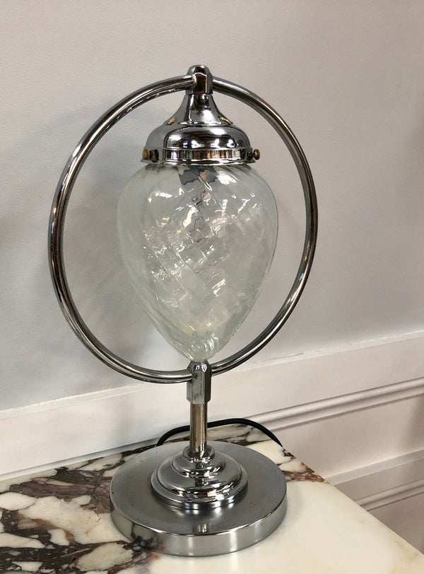 Decorative Art Deco chrome and glass table lamp that has been rewired and is in good original condition.