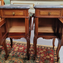 Pair of Walnut Louis XV style grey marble top bedside cabinets. Single drawer, one cupboard and lovely French cabriole legs. They have been sourced from France and are in good original condition.