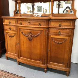 French Oak parquetry top sideboard with a glass top section for displaying and three cupboards and drawers for all your storage needs. Lovely carved details and is in good original detailed condition.