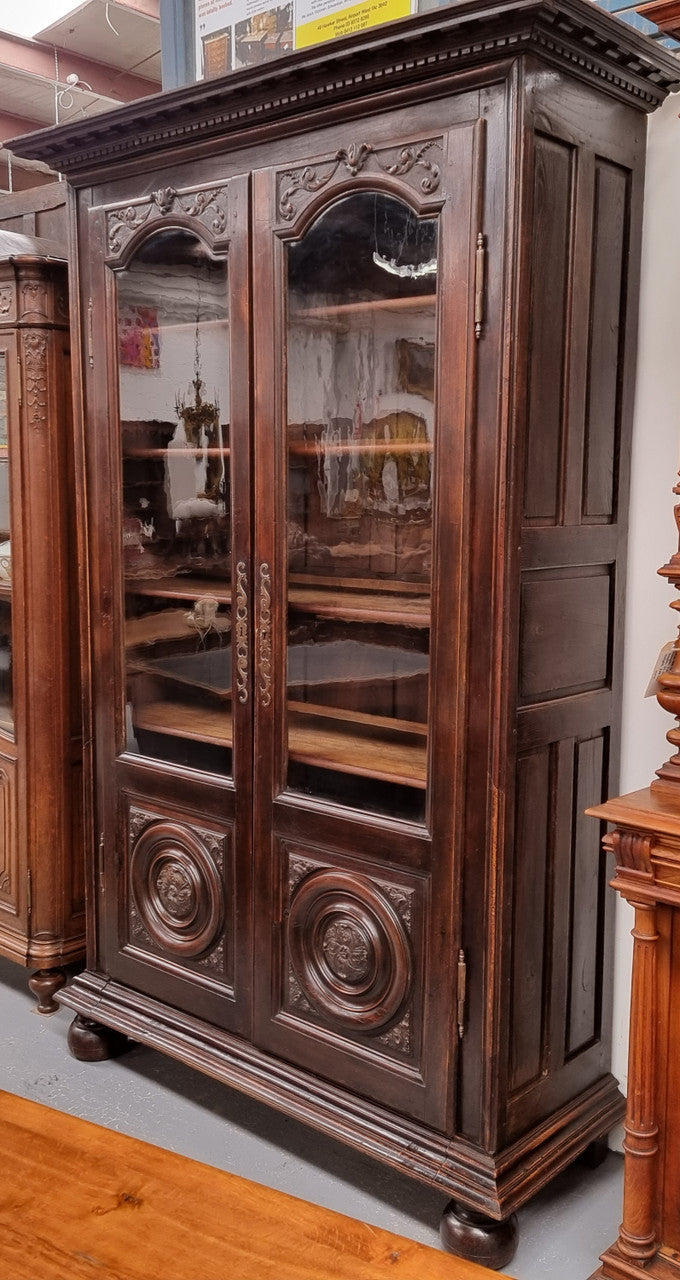 Substantial French Henry 2nd Walnut two door bookcase. It has five fully adjustable shelves and has been sourced from France. It is in good original detailed condition.