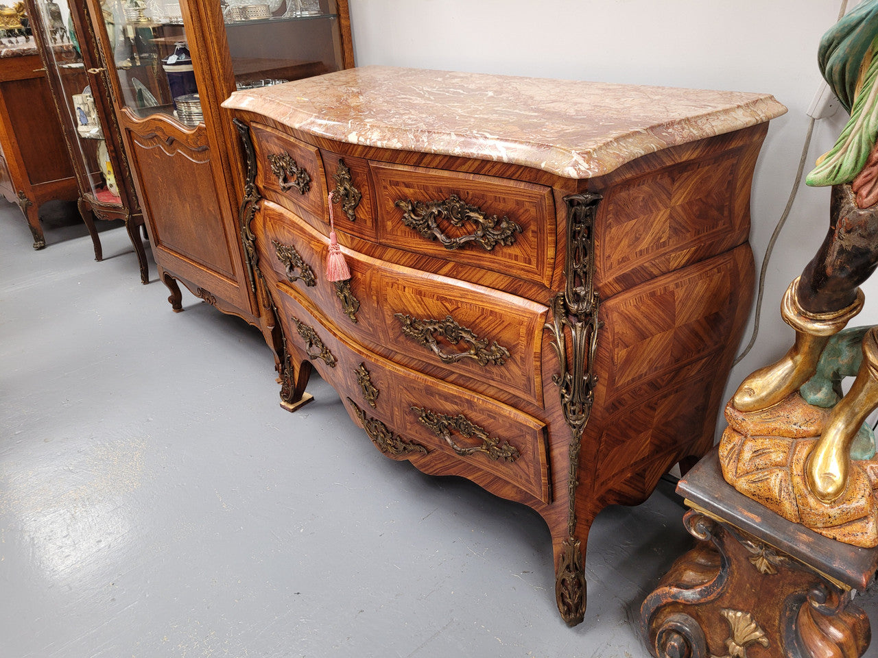 Beautiful French Louis XV style Kingwood inlaid marble top four drawer commode. It has decorative mounts and has been sourced from France. It is in good original detailed condition.