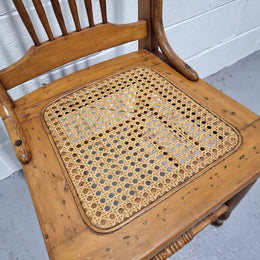 Australian Emu chair with cane inset seat. In good original condition.