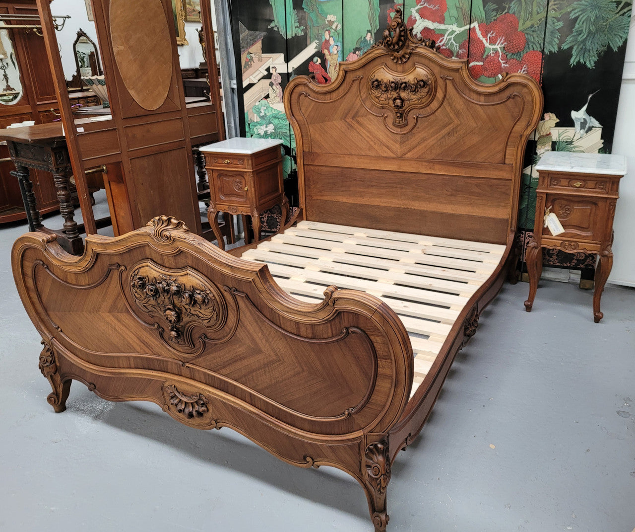 Beautifully carved French Walnut 19th Century queen bed head, foot and rails. It is in good detailed condition