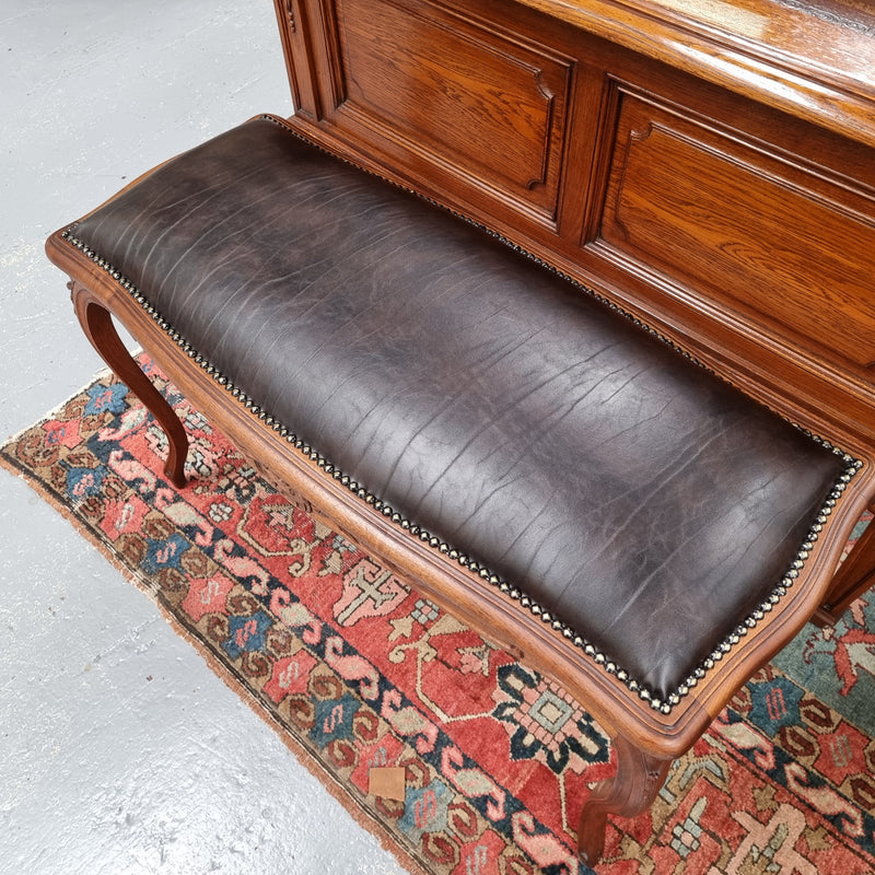 Impressive French Louis 15th style walnut upholstered duet leather stool. Very Good Condition.  Circa: 1930’s, sourced in France.