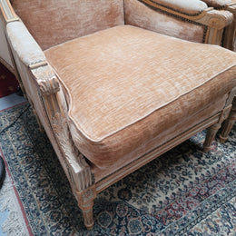 Pair of Louis XVI style painted arm chairs with carving & fluted legs. They have been sourced from France and the fabric is in good used original condition. Please view photos as they help form part of the description.