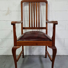 A very comfortable Black Wood Period leather seat armchair. In leather and chair are in good original condition.