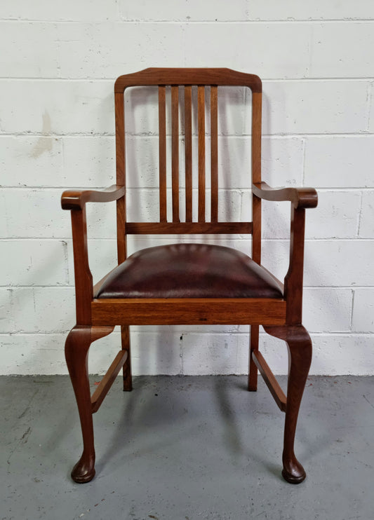A very comfortable Black Wood Period leather seat armchair. In leather and chair are in good original condition.