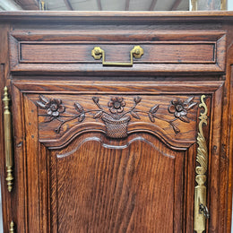 Louis 15th style oak 19th century cabinet with lovely brass hinges, handles & charming carving.  Circ: 1860's. In good original condition.