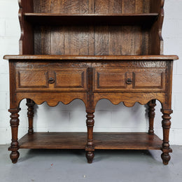 Rustic French Oak three shelf and two drawer kitchen dresser of pleasing small protions. Comes apart into two pieces for transport making it ideal for an apartment or unit. In very good original detailed condition.