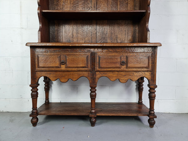 Rustic French Oak three shelf and two drawer kitchen dresser of pleasing small protions. Comes apart into two pieces for transport making it ideal for an apartment or unit. In very good original detailed condition.