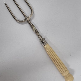 Elegant Antique pickle fork with a ivory handle. It is in good original condition, please view photos as they help form part of the description.