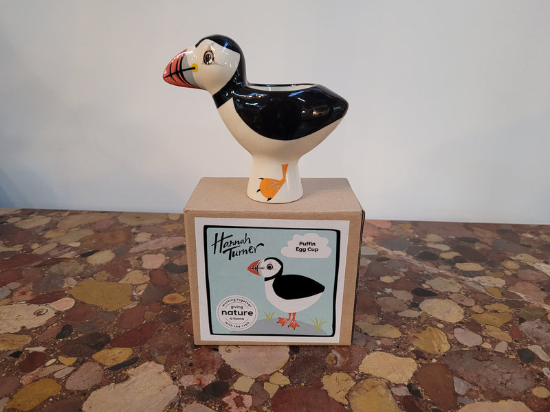 “Hannah Turner” England – delightful Puffin Egg Cup. Made for the Royal Society for Protection of Birds. 13cm Height, Length 14cm. In good condition please view photos as they help form part of the description.
