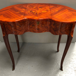 French Mahogany hidden dressing table with beautiful marquetry inlay. In good restored condition. Circa: 1950's