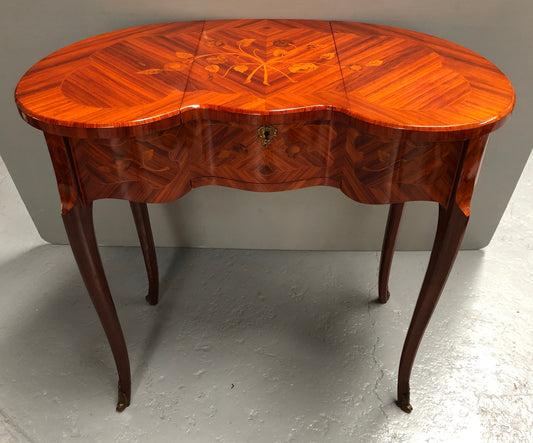 French Mahogany hidden dressing table with beautiful marquetry inlay. In good restored condition. Circa: 1950's
